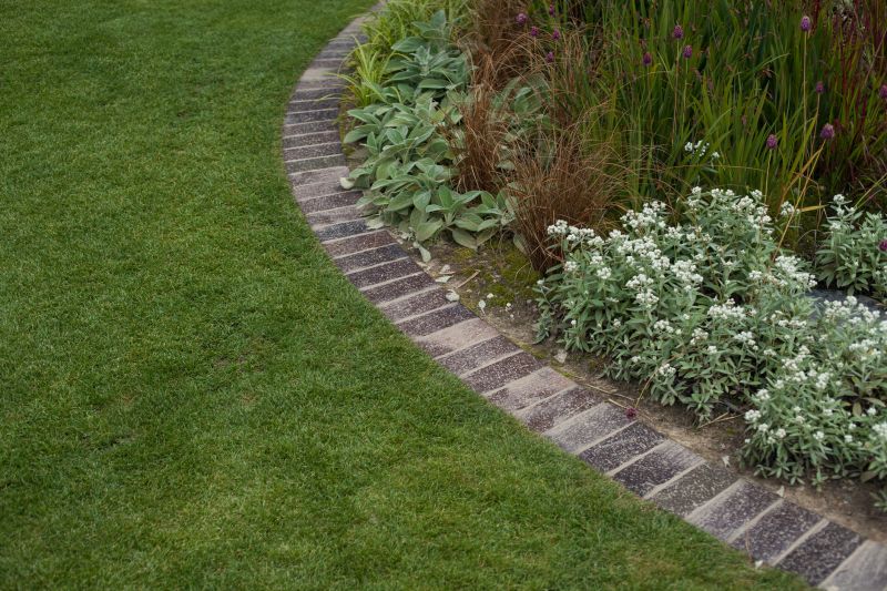 Lush Garden with Brick Curbing